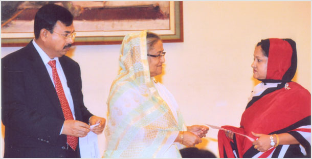 Prime Minister Sheikh Hasina handed over the fourth year's checks of Nine Lac and Sixty Thousand Taka